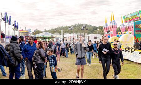 SARINA, QUEENSLAND, AUSTRALIA - AUGUST 2019: Crowds enjoying sideshow alley at local country show Stock Photo