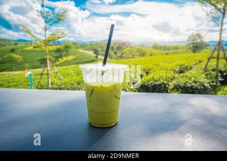 Fresh milk green tea drink made from raw materials from Chui Fong Farm, famous for the sound of Chiang Rai Province, Thailand. Stock Photo