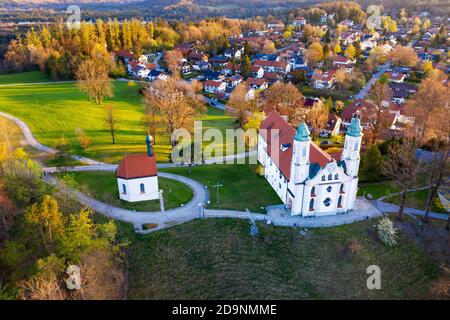 Holy Cross Church and Leonhardi Chapel on Kalvarienberg in the morning light, Bad Tölz, Isarwinkel, Alpine foothills, drone image, Upper Bavaria, Bavaria, Germany Stock Photo