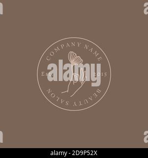 Beauty salon Logo hand holding a Ginkgo leaf In trendy linear minimalist style. Vector Round Emblem Beauty Studio Stock Vector