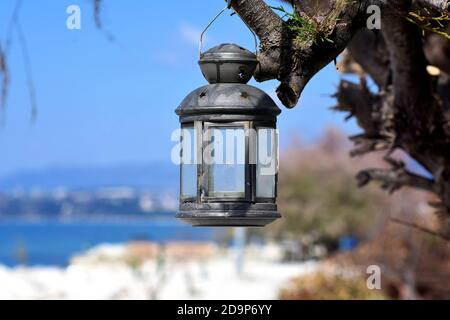 Fantasy Candle Lamp Hanging on the Tree with Bokeh Background Fairy tail Concept Stock Photo