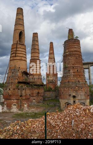 Old lime kilns of a abandoned marble and lime factory close-up on a cloudy August day. Ruskeala, Karelia Stock Photo