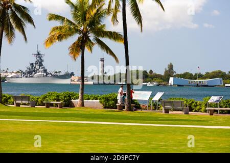 Pearl Harbor, HI, USA - February 09, 2011 : Battleship Missouri, the old flight tower on Ford Island and the U.S.S. Arizona Memorial Stock Photo