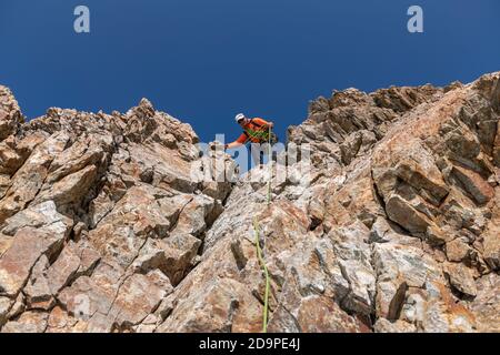 Europe, Switzerland, Canton Bern, Bernese Oberland, Mönch, mountaineer on the descent Stock Photo