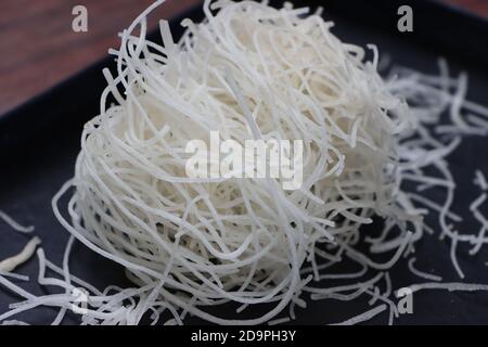 Rice noodles or pasta or veemicelli on black background Stock Photo