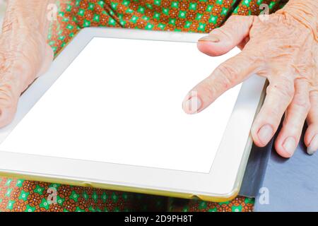 horizontal photo of closeup asian elder woman using tablet, technology concept. Stock Photo