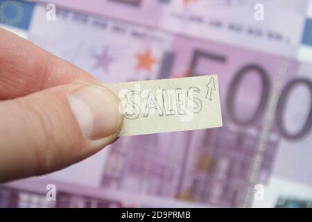 sales growth idea, tag with the inscription on the background of the euro Stock Photo