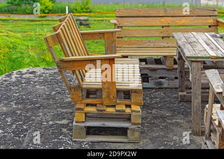 Bench made from used cargo pallets recycling Stock Photo