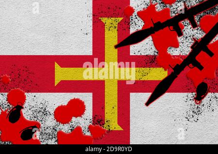 Guernsey flag and rocket launchers with grenades in blood. Concept for terror attack and military operations. Gun trafficking Stock Photo