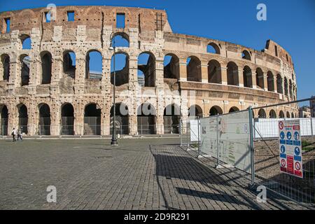 ROME ITALY  7 November 2020. The Roman colosseum which is normally busy with foreign tourists and sightseers stands deserted. The Italian government led by Premier Giuseppe Conte has declared a new emergency decree to combat the second wave of covid-19, dividing Italy into risk areas and a  new three-tier system  based on a colour code according to the intensity of the epidemic, red (high-risk), orange (medium risk) and yellow (low risk) zones. The new system comes into effect on 6 November and will be in place until 3 December. Credit: amer ghazzal/Alamy Live News Stock Photo