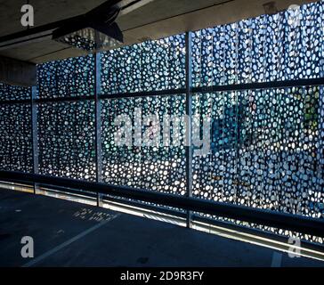 Perforated metal cladding panels seen from inside of a multi-storey parking garage , Finland Stock Photo