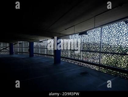 Perforated metal cladding panels at multi-storey parking garage , Finland Stock Photo