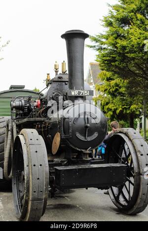 A steam engine/ steam locomotive on display in the street for Trevithick Day celebrations in Camborne, Cornwall.  The event is a Cornish tradition Stock Photo