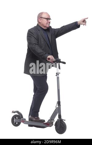 side view . Mature man with electric scooter looking forward Stock Photo