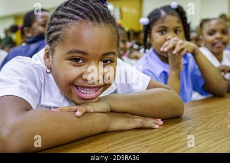 Miami Florida,Liberty City Charles Drew Elementary School,student students Black African man,American girl female smiles smiling, Stock Photo