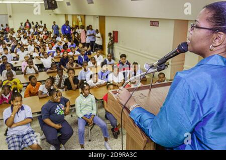 Miami Florida,Liberty City Charles Drew Elementary School,student students Black African man,American woman female teacher speaks speaking assembly mi Stock Photo