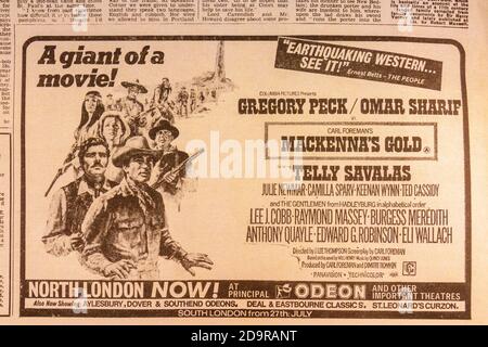 Advert for the film 'Mackenna's Gold' inside an Evening Standard souvenir newspaper (replica) for the Apollo 11 Moon landings on 21st July 1969. Stock Photo