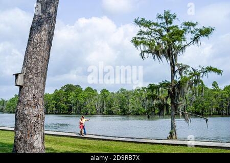 Louisiana Northshore,Madisonville,Fairview Riverside State Park along Tchefuncte River,man woman female couple, Stock Photo