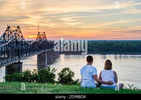 Mississippi Vicksburg Mississippi River Bridge,sunset,man woman female couple watch, Stock Photo