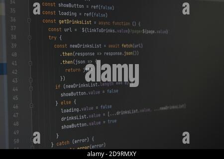 The program javascript code on the computer black screen. The concept of website, internet, cyber security, hacking and software. Stock Photo