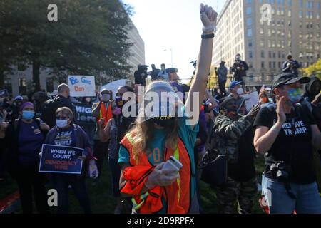 Washington, DC, USA. 7th Nov, 2020. People react as media announce that Democratic Party nominee Joe Biden has won the 2020 US presidential election in McPherson Square. CNN, NBC and AP project Biden to win the election as he has surpassed the 270 electoral votes. Credit: Yegor Aleyev/TASS/Alamy Live News