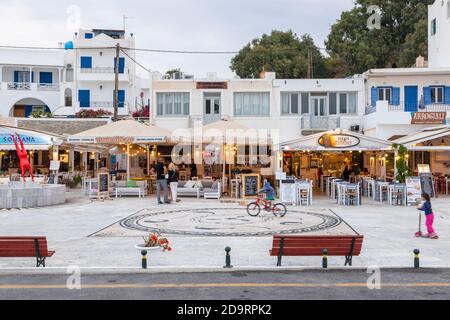 Chora, Ios Island, Greece- 19 September 2020: View of the center of the old port city. Restaurants and shops. Stock Photo