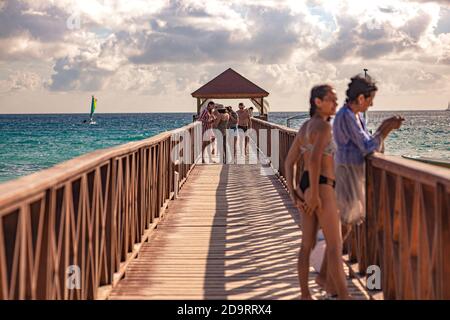 DOMINICUS, DOMINICAN REPUBLIC 6 FEBRAURY 2020: People on the pier in Dominicus Stock Photo