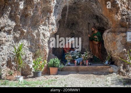 Statue Madonna and Saint Joseph in a cave in Sicily Stock Photo