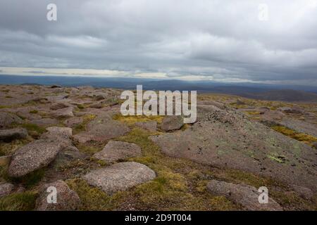 View of mountains and boulder fields from summit of Cairn Gorm,  Cairngorms National Park, Scotland, UK. Stock Photo