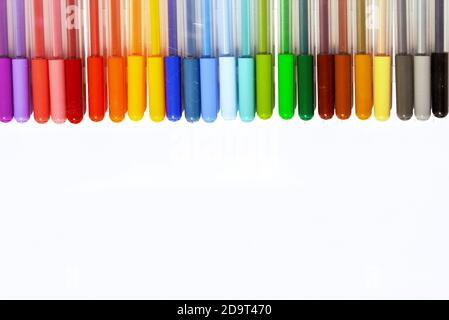 Multicolored markers or felt-tip pens on a white background. Stock Photo