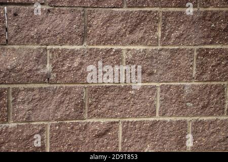 Old red gringe brick wall in a background image Stock Photo