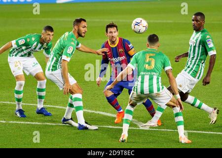 Camp Nou, Barcelona, Catalonia, Spain. 7th Nov, 2020. La Liga Football, Barcelona versus Real Betis; Leo Messi is closed down by the Betis defenders Credit: Action Plus Sports/Alamy Live News Stock Photo