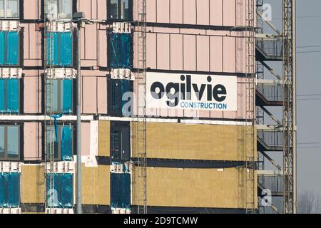 Ogilvie construction sign on building under construction, Glasgow, Scotland, UK Stock Photo