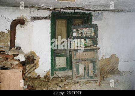 Hateg Country, Romania. Interior of an old abandoned house falling apart. Stock Photo