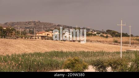 Sicilian rural panorama during sunset in summertime Stock Photo