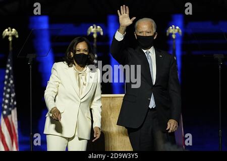 Wilmington, United States. 07th Nov, 2020. President-elect Joe Biden, right, takes the stage with Vice President-elect Kamala Harris on Saturday, November 7, 2020 in Wilmington, Delaware. Biden defeated President Donald Trump to become 46th president of the United States. Pool photo by Andrew Harnik/UPI Credit: UPI/Alamy Live News Stock Photo