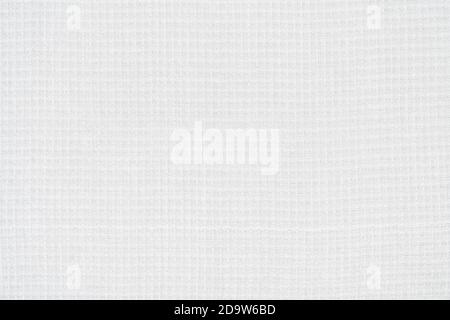 Background from white texture of canvas cotton fabric material. Close-up surface of blank abstract textile pattern backdrop, ready for text Stock Photo