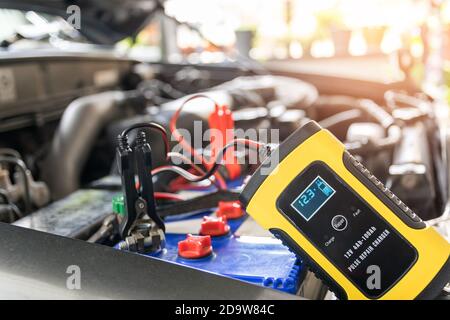 Instrumentation of voltage and temperature of the car battery. Stock Photo