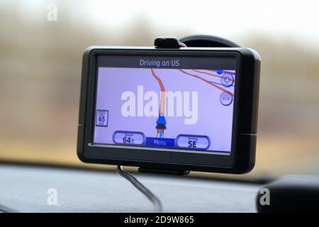 GPS Navigation System Attached to the Windshield Stock Photo