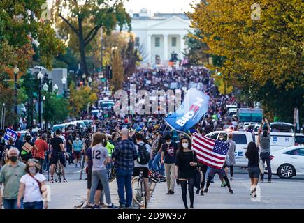 Washington, DC, USA. 7th Mar, 2017. People celebrate in the streets near the White House after the announcement of President-Elect Joe Biden in Washington, DC (Credit Image: © Riccardo SaviZUMA Wire) Stock Photo