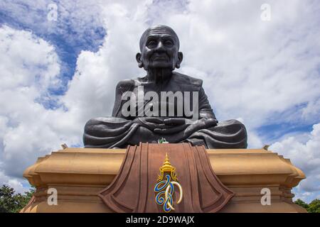 Wat Huay Mongkol, Thailand - September 21, 2019: The Giant Luang Phor Thuad Statue is the world’s largest black monk and famous in Prachuap Khiri Khan Stock Photo