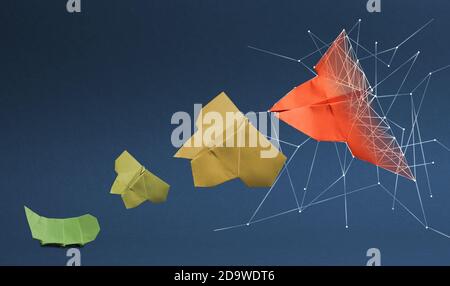 Transformation from caterpillar to butterfly, analog to digitalization, business concept in paper folding Stock Photo