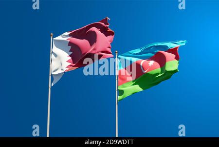 Beautiful national state flags of Qatar and Singapore together at the ...