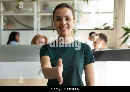 Portrait Of Woman Hr Recruiter Stretching Hand For Greeting To Camera 