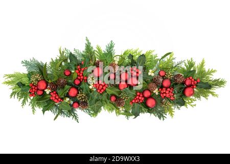 Winter greenery border with cedar cypress leylandii leaves & pine cones on  white background. Natural flora for the Christmas & New Year season Stock  Photo - Alamy