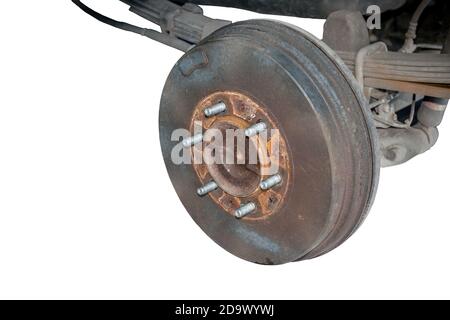 Rusty drum brakes, rear on red car. Change the old to new brake disc on car  in a garage. Auto mechanic repairing Stock Photo - Alamy