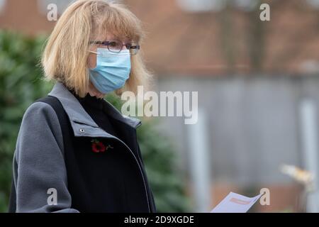 London, UK. 8th November, 2020. The local community holds a small, social distanced wreath-laying event at the War Memorial next to Brentford Library. Credit: Liam Asman/Alamy Live News Stock Photo