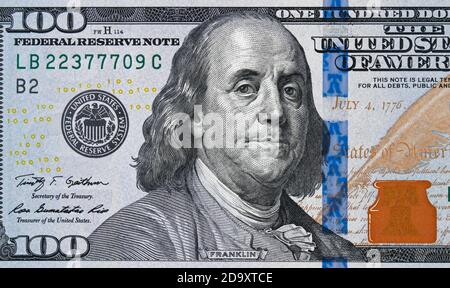 US 100 dollar bill close up, USA federal fed reserve note. American dollar is the official currency of the United States of America. Stock Photo