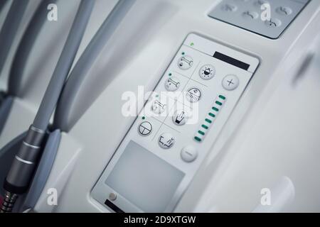 Close up view of medical chair's control panel with buttons Stock Photo