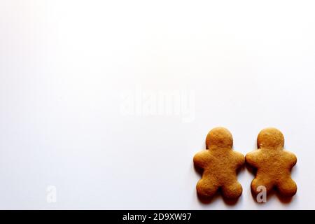 Two gingerbread men on a white background Stock Photo